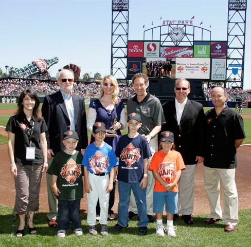 Giants Community Fund Executive Director Sue Petersen and San Francisco Giants Executive Vice President and COO Larry Baer
